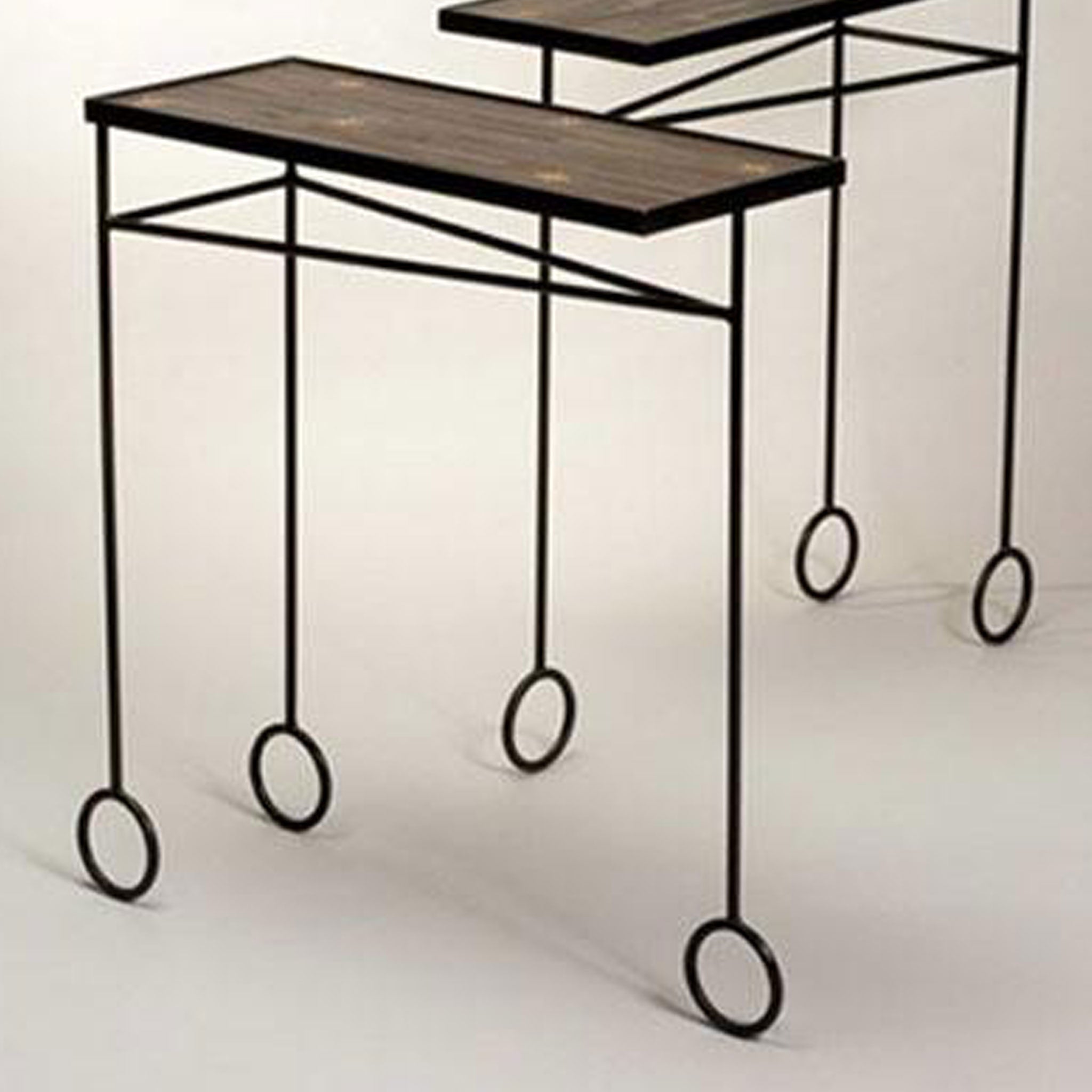 Metal ebony and straw inlayed console tables - Jean Royere